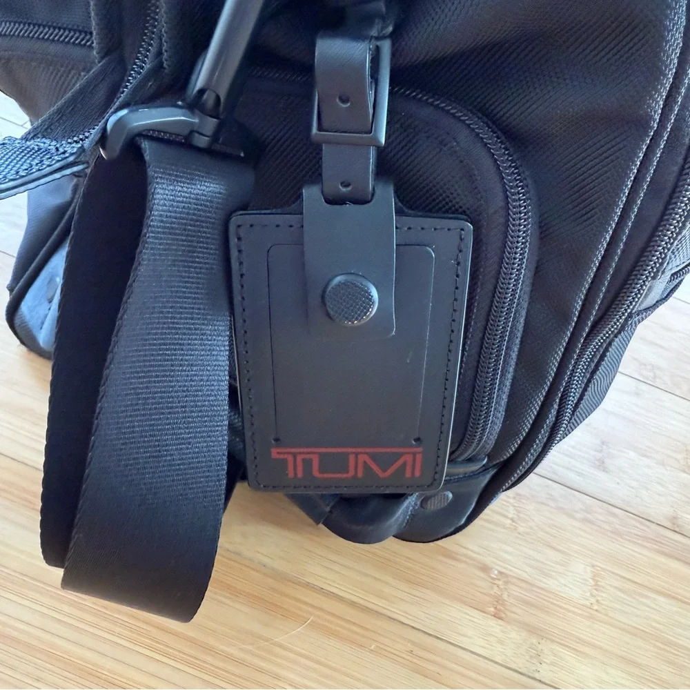 Tumi Black Duffel Bag with Adjustable Shoulder Strap